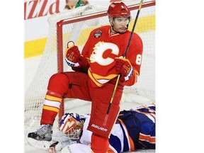 Calgary Flames centre Joe Colborne celebrates a goal against the New York Islanders during a game last March. The restricted free agent re-signed with the Flames on Tuesday, avoiding arbitration.