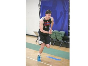 Calgary’s Jordan Bachynski participates in drills during the 2014 NBA Draft Combine last month in Chicago.