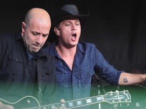 Rob Thomas grooves with his guitar player Friday July 11, 2014 at the annual Oxford Stomp concert at Fort Calgary.