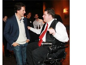 Calgary MLA Kent Hehr chats with Liberal leadership candidate Justin Trudeau in January 2013.