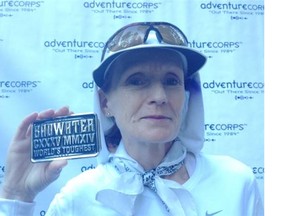Calgary’s Lorie Alexander displays the belt buckle she was given for finishing the world’s toughest foot race on Tuesday night — the 135 mile Badwater Ultramarathon.