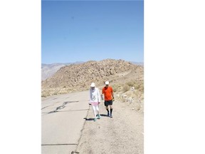 Calgary marathon runner Lorie Alexander during the last climb of the gruelling 135-mile Badwater Ultramarathon. Alexander became the only woman to complete the first Badwater Ultra Cup challenge, running three gruelling ultramarathons in 2014.