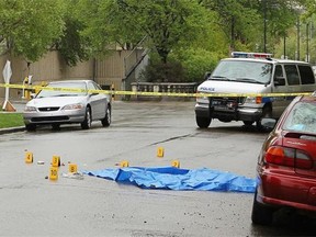 Calgary police at the scene of the assault at the intersection of 15 Ave. and 6 St. S.W. on May 24, 2012.