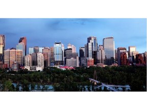 The Calgary skyline seen from Crescent Heights hill above the Bow River as the sun sets. The government’s population projection report suggests the city of Calgary could reach 2.4 million people over the next three decades.