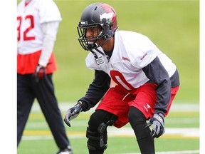 Calgary Stampeders defensive back, Quincy Butler gets low during practice at McMahon Stadium on Thursday.