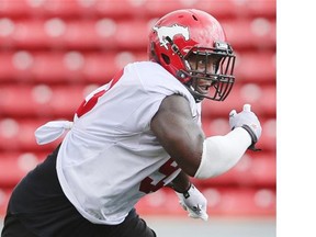 Calgary Stampeders defensive tackle Micah Johnson works during practice on Monday. He’s quickly proving he’s back to 100% after his surgically repaired knee.