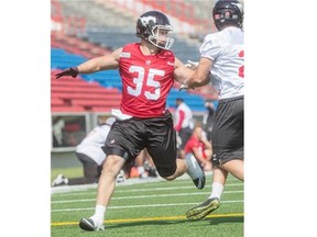 Calgary Stampeders fullback/long snapper Tim St. Pierre works on a drill in practice.