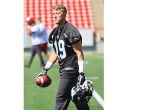 Calgary Stampeders quarterback Bo Levi Mitchell heads out to practise at McMahon Stadium on Thursday.