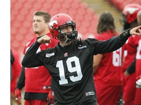 Calgary Stampeders quarterback Bo Levi Mitchell strikes a pose as he practices with teammates during their walkthrough at McMahon Stadium on Friday.