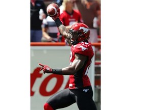 Calgary Stampeders receiver Maurice Price celebrates a touchdown against the Montreal Alouettes during the 2014 season opener.