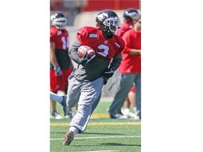 Calgary Stampeders running back Jock Sanders carries the ball during practice at McMahon Stadium on Tuesday.