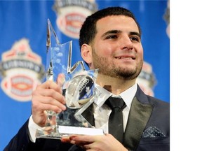 Calgary Stampeders star kicker Rene Paredes celebrates with the most outstanding special teams player award last November in Regina.