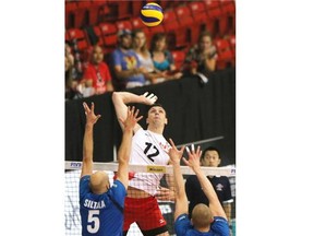 Canada’s Gavin Schmitt goes up for a spike during the Canada vs. Finland FIVB World League volleyball game at the Corral on Sunday night.
