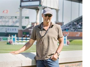 Canadian chef d’equipe, Mark Laskin, watches on at Spruce Meadows during the North American tournament in Calgary