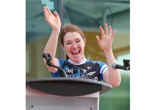 Canadian Olympian Clara Hughes waves to the crowd during her stop in Calgary at Canada Sports Hall of Fame on her Clara’s Big Ride bicycle ride across Canada. The ride is set to last 110 days and is intended to raise awareness of the stigma around mental health. 
 (Stuart Gradon/Calgary Herald)