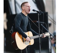 Canadian rock icon Bryan Adams performs at the Stampede Roundup at Fort Calgary on Wednesday.