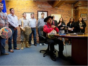 Chief Roger William, right, of the Xeni Gwet’in First Nation, is flanked by chiefs and other officials as he pauses while speaking during a news conference in Vancouver, B.C., after the Supreme Court of Canada ruled in favour of the Tsilhqot’in First Nation, granting it land title to 438,000-hectares of land on Thursday June 26, 2014.