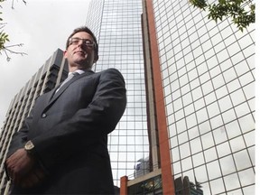 Chris Law, senior vice-president/partner, of Colliers International, across from the older Standard Life building in downtown Calgary.