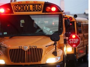 A city report that rejects lifting the prohibition on school bus flashing lights and stop arms on city streets cites U.S. studies that attributed the use of the safety measures with six child deaths in the 2011-2012 school year.