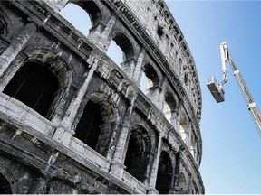 Cleaning the Colosseum, which is expected to be completed by October 2016, will cost more than $35 million Cdn. Workers are using toothbrushes to clean the facade.