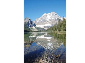 On a clear, windless day, you can see a perfect reflection of Mount Ball in Shadow Lake.