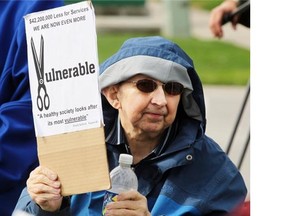 Client Baird Jarrett joined over 200 others during a protest outside Alison Redford´s office in attempt voice their concerns about the largest-ever planned cuts to supports to persons with developmental disabilities through the PDD program on in May 2013.
