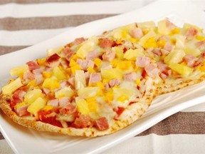 Hawaiian Pita Pizzas work well as a busy school night meal or fit nicely in a lunch bag.