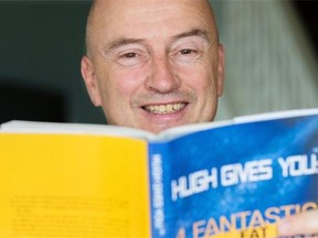 Hugh Esling, poses in his home after completing his book about how he lost weight four times.