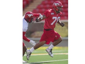 Damon McDaniel, the younger brother of Stamps receiver Marquay McDaniel, runs at Stampeders rookie training camp on Thursday.