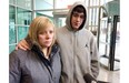 Debbie Hogarth (left) with son Ryan talks to reporters outside court on February 14, 2014, after Byron Blanchard pleads guilty to manslaughter.