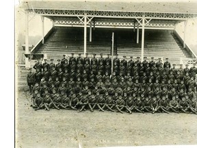 C Squadron of the 12th Canadian Mounted Rifles assembled at the grandstand at the Red Deer Fairgrounds, May 1915.