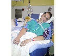 Denis Telyakov is pictured receiving treatment in hospital following a beating in Calgary Remand Centre.