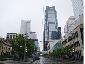 Downtown Calgary feels more deserted on Friday, June 21, 2013, as people were advised to stay away from downtown due to possible flooding.