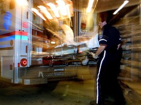 A new report points to serious delays in emergency department care, saying half of those admitted to an in-patient bed had waited at least 10 hours. In this photo, an ambulance at the Royal Alexandra Hospital is shown on March 14, 2002.