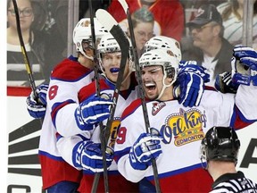 Edmonton Oil Kings left winger Mitchell Moroz, foreground, celebrates with teammates after scoring against Calgary last January. One of two Calgarians on the Western Hockey League champions, Moroz is looking forward to returning to the Memorial Cup.