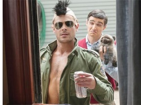 Zac Efron, left, and Dave Franco in Neighbors. The comedy takes on a random tone that stumbles happily along.