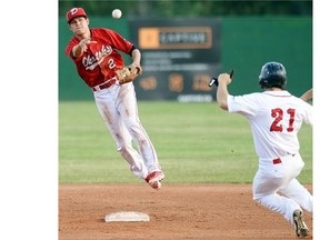 Okotoks' Ellis Kelly throws to first in a game against Regina last month.