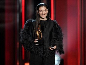 Lorde accepts the award for top new artist at the Billboard Music Awards at the MGM Grand Garden Arena on Sunday, May 18, 2014, in Las Vegas. (Photo by Chris Pizzello/Invision/AP)