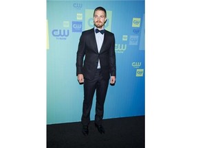 Stephen Amell attends the CW Network Upfront on Thursday, May 15, 2014 in New York. (Photo by Charles Sykes/Invision/AP)