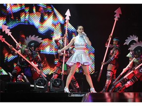 Katy Perry roars at the Scotiabank Saddledome as part of The Prismatic World Tour in Calgary on Friday, Aug. 29, 2014.