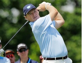Ernie Els, of South Africa, seen teeing off in The Memorial tournament on Sunday, is coming to Calgary on July 21 for a charity tournament dear to his heart.