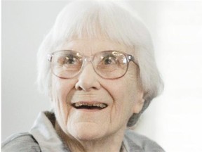 FILE - In this Aug. 20, 2007, file photo, author Harper Lee smiles during a ceremony honoring the four new members of the Alabama Academy of Honor at the Capitol in Montgomery, Ala. þÄúTo Kill a MockingbirdþÄù will be made available as an e-book and digital audiobook in July 2014, filling one of the biggest gaps in the electronic library. Author Harper Lee said in a rare public statement Monday, April 28, 2014, issued through HarperCollins Publishers, that while she still favored þÄúdustyþÄù books she had signed on for making þÄúMockingbirdþÄù available to a þÄúnew generation.þÄù (AP Photo/Rob Carr, File) ORG XMIT: NY108