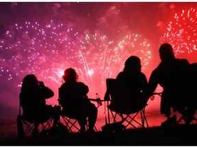 Fireworks fans watch the sky light up over Elliston Park in 2012. Alberta is looking at banning consumer fireworks.