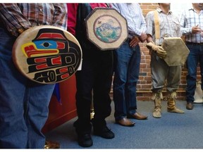 First Nations chiefs hold drums during a news conference in Vancouver after the Supreme Court of Canada ruled in favour of the Tsilhqot’in First Nation, granting it land title to 1,900 square kilometres of land on Thursday.