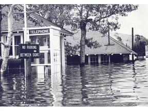 Flood waters swamp the Waterton townsite during the June 1964 flood. Calgary Herald File Photo