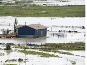 A flooded home is seen on the Siksika reserve on Sunday.