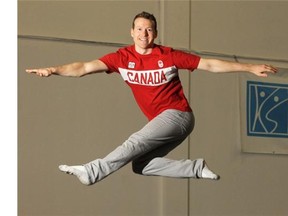 Former Olympic gymnast Kyle Shewfelt jumps at his gym in Calgary in April. On Friday night, the Calgarian will be inducted into the Olympic Hall of Fame during a special gala in his hometown.