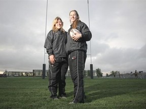 From left, Sammy Crandell and Maria Samson, of the Canadian women’s rugby team heading to the World Cup later this year, at the Calgary Rugby Union in Calgary, Alberta Wednesday, May 28, 2014. 
  
 (Stuart Gradon/Calgary Herald) 
  
 (For Sports story by Jefferson Hagen) 
 00055884A