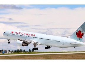 Gavin Young, Calgary Herald CALGARY, AB: JUNE 28, 2014 -- Air Canada flight AC9, a Boeing 767 to Tokyo, Japan, was the first scheduled flight to take-off from the Calgary International Airport's new $600 million runway on Saturday afternoon June 28, 2014. Gavin Young/Calgary Herald  (For City section story by None) Trax# 00056678A