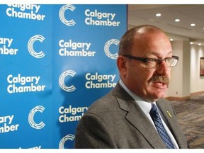 Gavin Young, Calgary Herald 
 CALGARY, AB: JUNE 24, 2014 -- PC leadership candidate Ric McIver talks with the media after making a speech to Calgary's business community at a Calgary Chamber of Commerce breakfast at the Telus Convention Centre on Tuesday June 24, 2014. 
 Gavin Young/Calgary Herald 
 (For City section story by James Woods) Trax# 00056615A